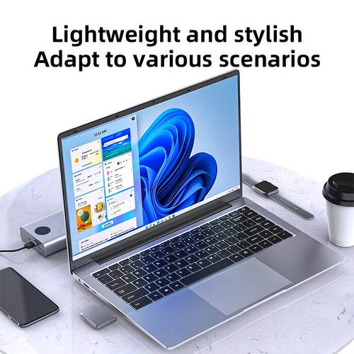 Ultra-slim silver laptop with thin bezels, Windows 11 desktop, black keyboard, large trackpad, and side ports.
