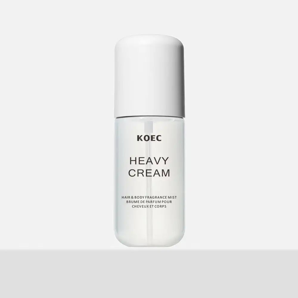 KOEC Heavy Cream 50ml moisturizing hair & body fragrance mist in a clear cylindrical bottle with white cap.