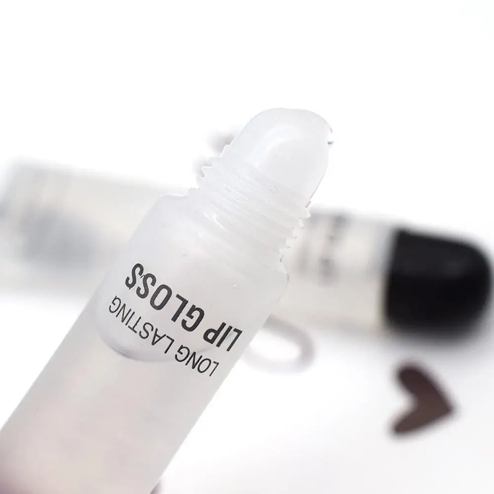 Clear, hydrating lip gloss tube with a smoothing rollerball applicator for long-lasting, plump, waterproof lip makeup.