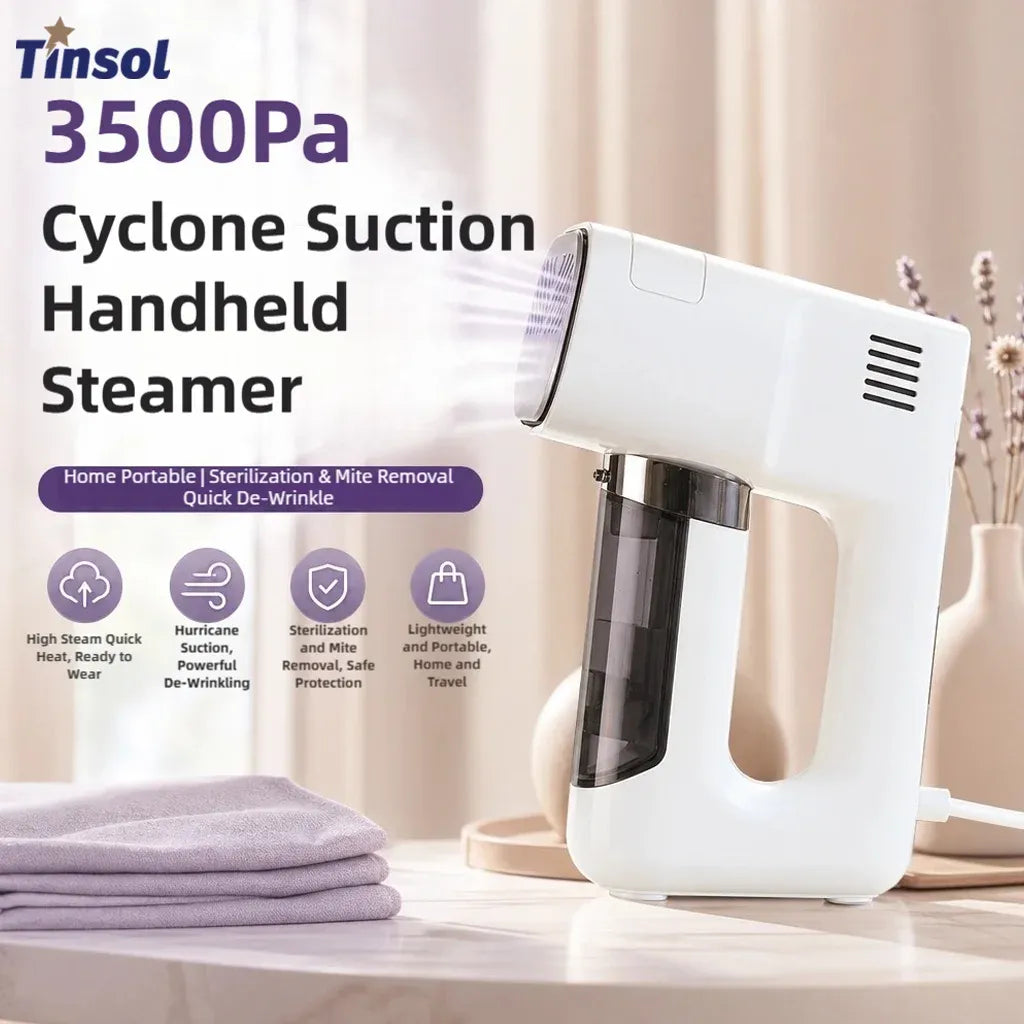 Tinsol handheld steamer releasing steam next to folded purple fabric for quick, portable clothes de-wrinkling.