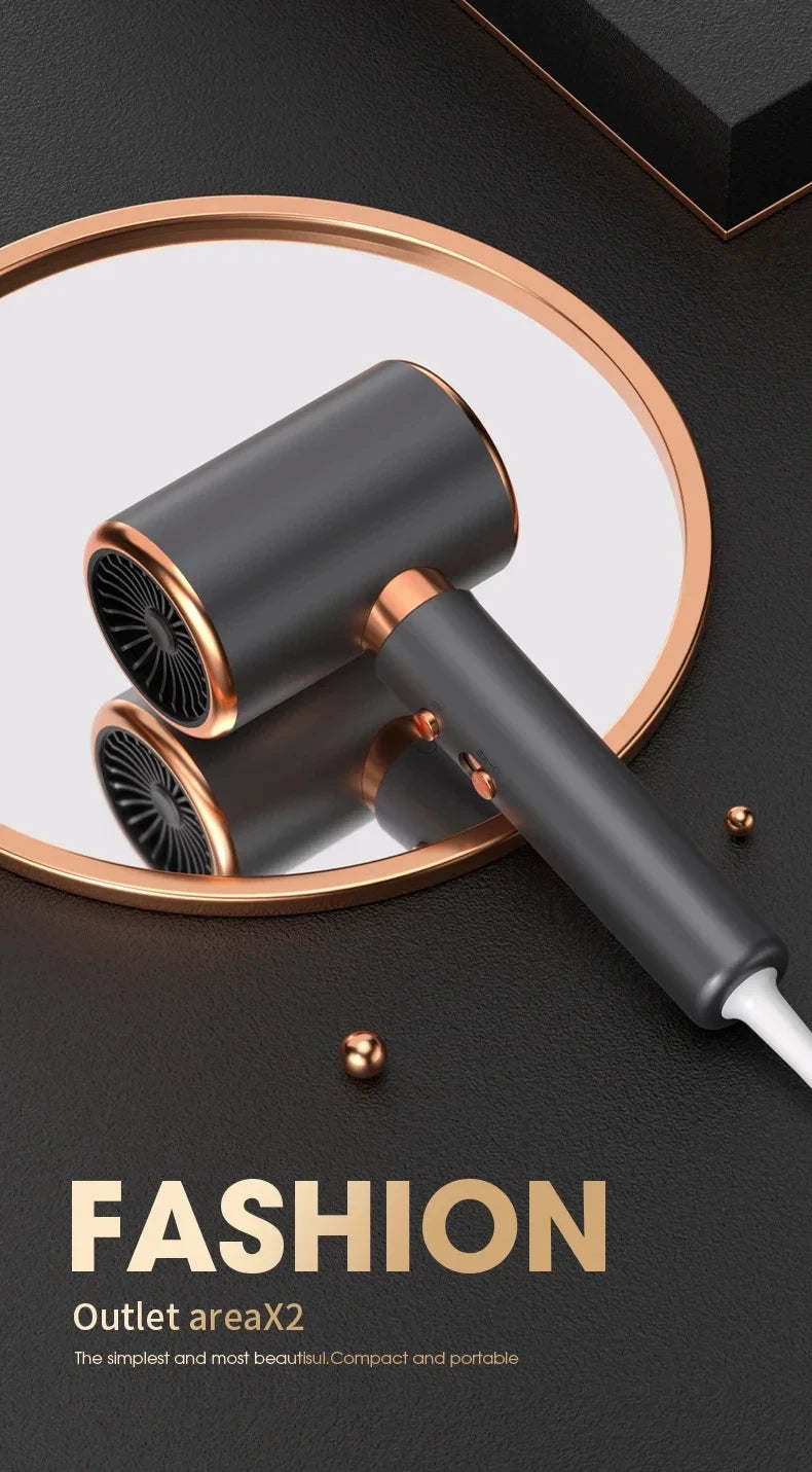 Dark gray and rose gold professional 2000W ionic hair dryer with compact design reflected in a circular mirror.