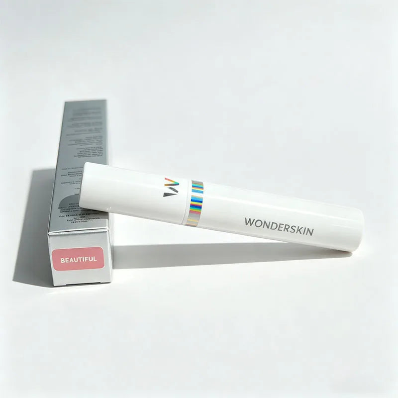Wonderskin peel-off lip stain in 'Beautiful' pink shade. Long-lasting, waterproof lip makeup tube and box packaging.