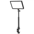 LED panel light on an adjustable black metal stand with a desk clamp for video conferencing and streaming.