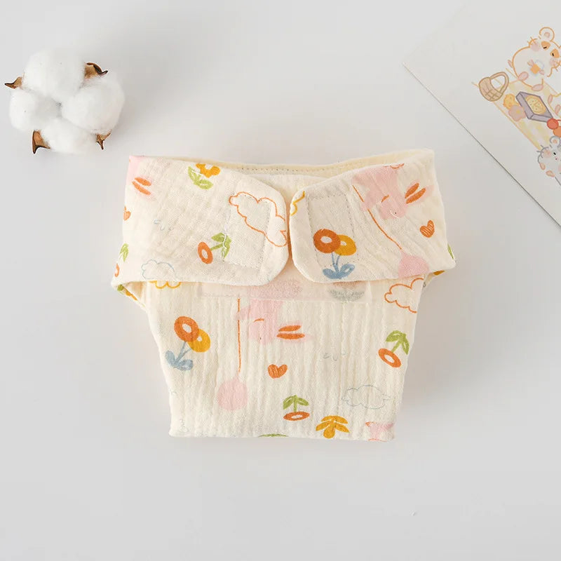 Cotton muslin baby diaper cover with cute bunny, cloud, and flower print. Soft, breathable baby care essentials.