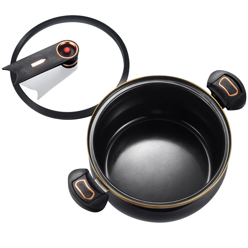 Black micro pressure cooker pot with gold trim and side handles, lid removed to show interior