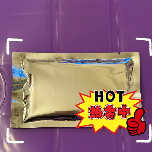 Gold foil heat pack sachet with red 'HOT' badge and chili icon