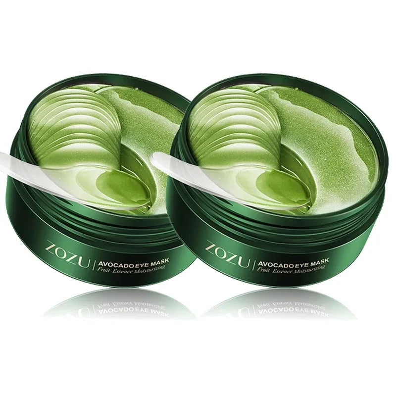 Two avocado eye mask jars with applicator spoons, stacked green gel layers