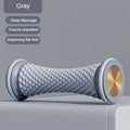Gray manual foot massage roller with textured surface for plantar fasciitis, muscle relief, and fascia relaxation.
