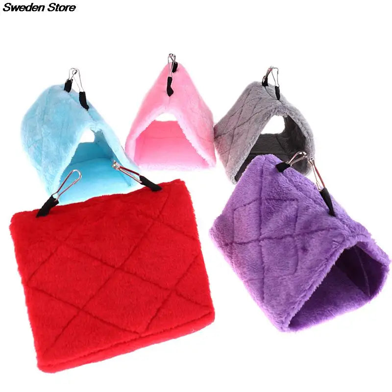 Soft, hanging plush beds for hamsters and birds in assorted colors, perfect for cozy, warm small pet cage nesting.