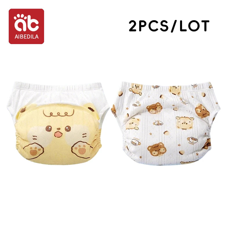 AIBEDILA 2-pack baby training diapers with cute cartoon bear designs for infants.