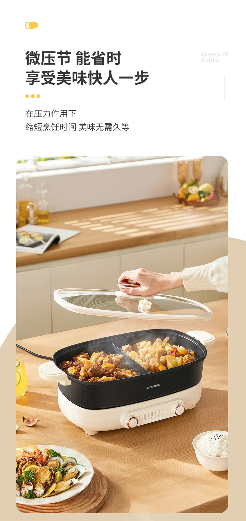 White electric hot pot with black bowl and open lid, shown on a kitchen counter