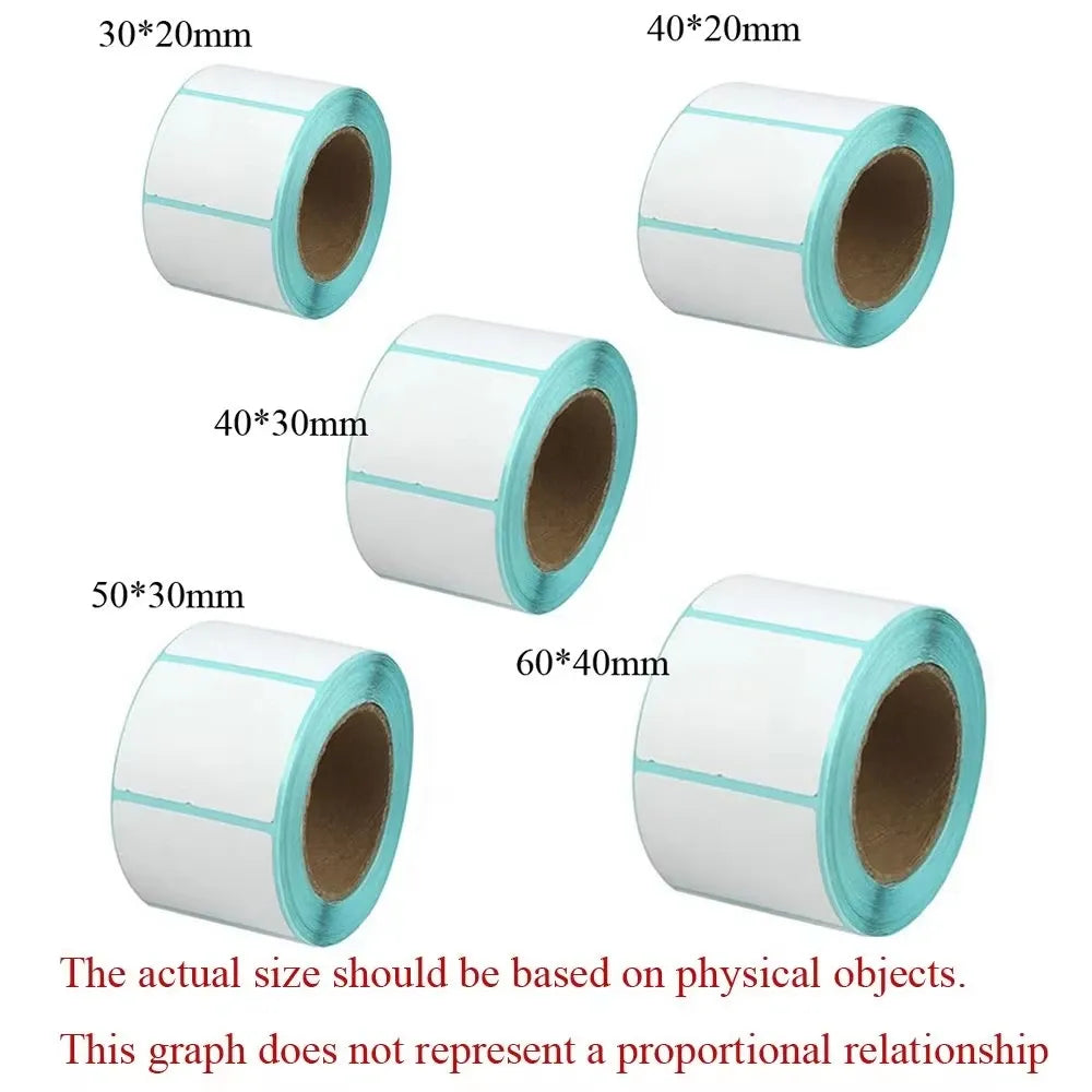 Assorted thermal label sticker rolls showing multiple sizes, white labels with teal borders