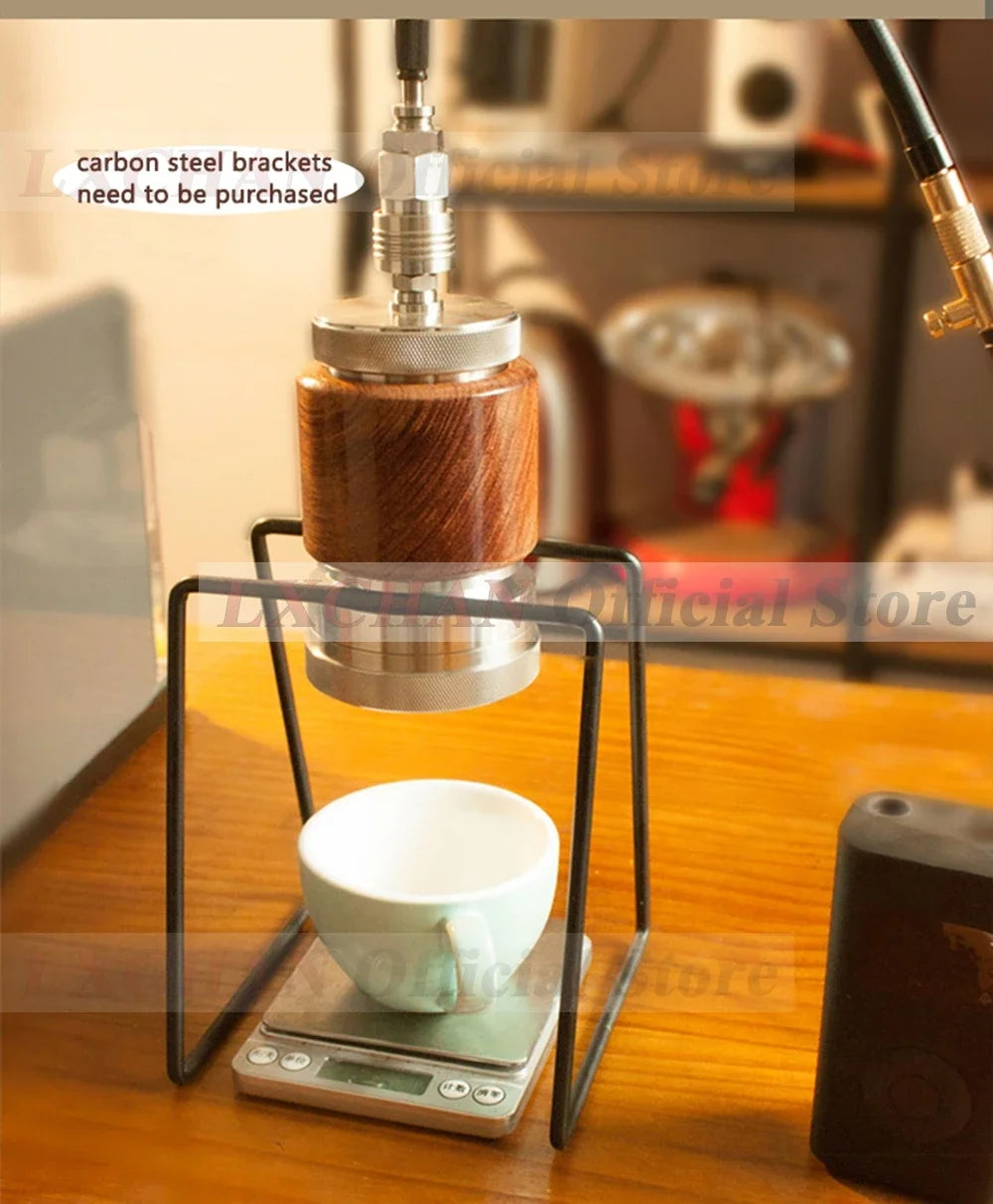 LACHAN manual coffee dripper with wood and metal design, mounted on a black carbon steel stand over a digital scale.