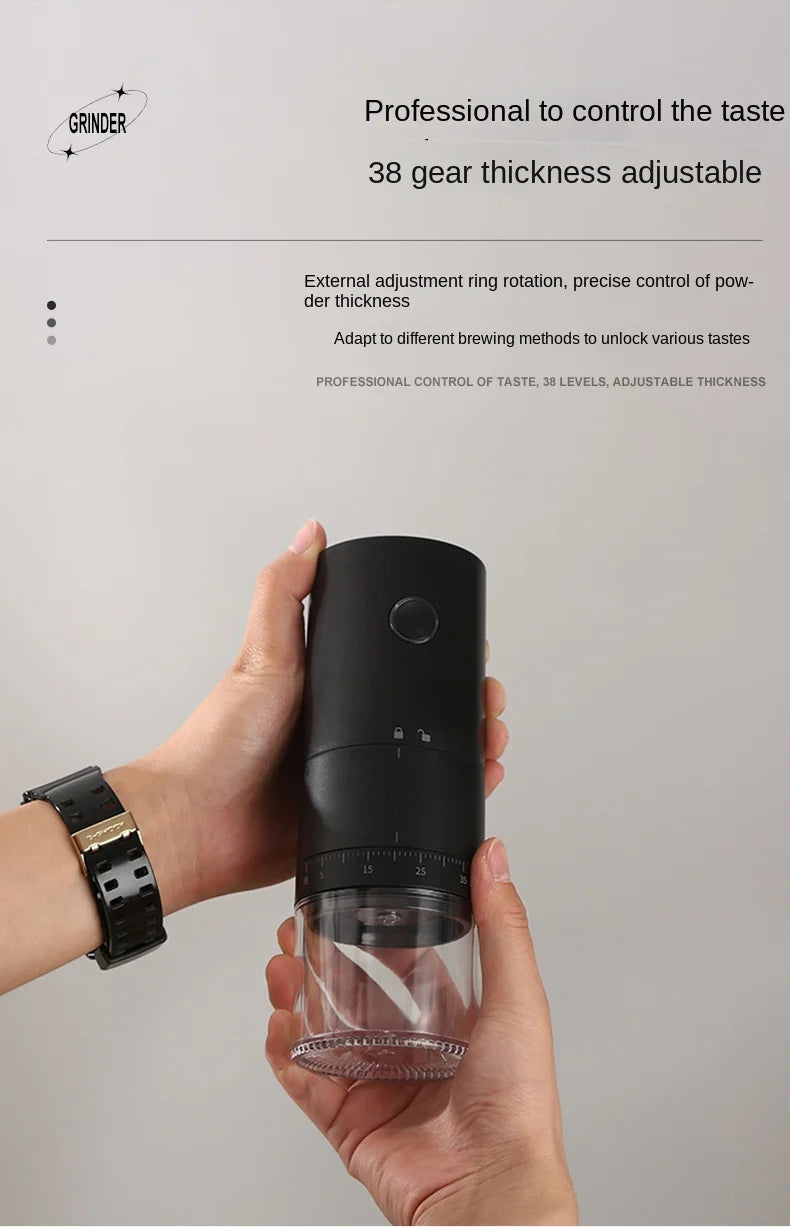 Handheld matte black coffee grinder with 38-gear precision adjustment and clear glass catch container.