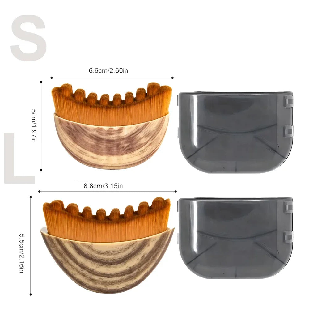 Two sizes of wood-patterned, crescent-shaped facial massage brushes with brown bristles and grey protective cases.