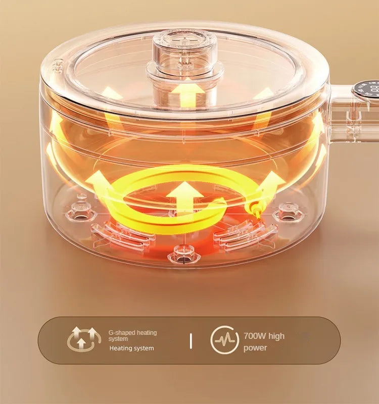 Transparent inner lid of electric hot pot showing airflow heating arrows and 700W.
