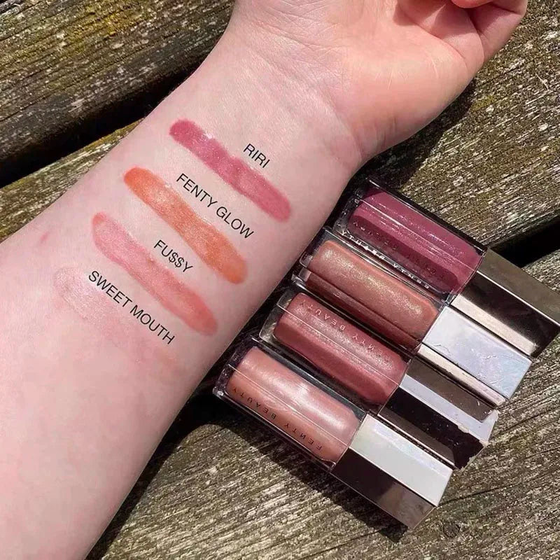 Tidesmit transparent glitter lip plumper liquid lipstick swatch for a moisten shine finish in face makeup