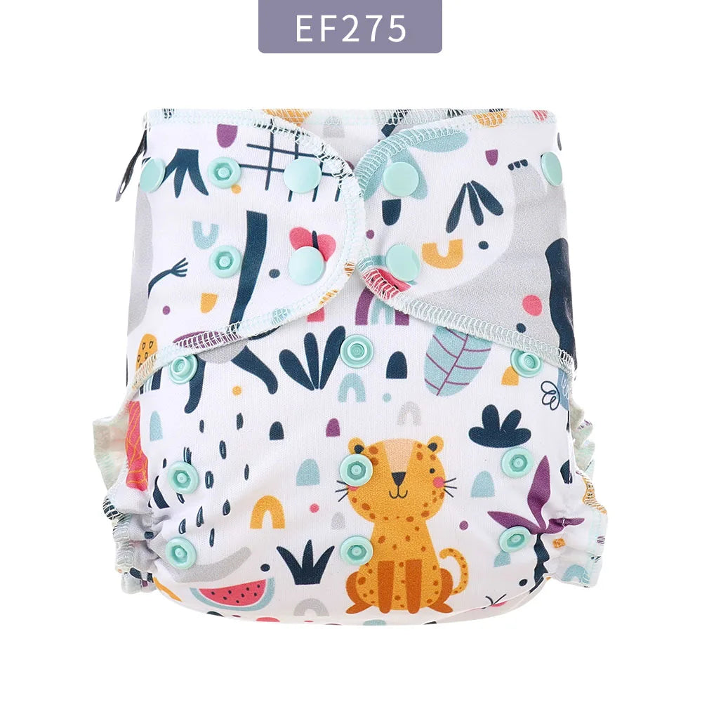 Reusable cloth baby diaper with adjustable snaps and cute leopard and jungle print pattern.