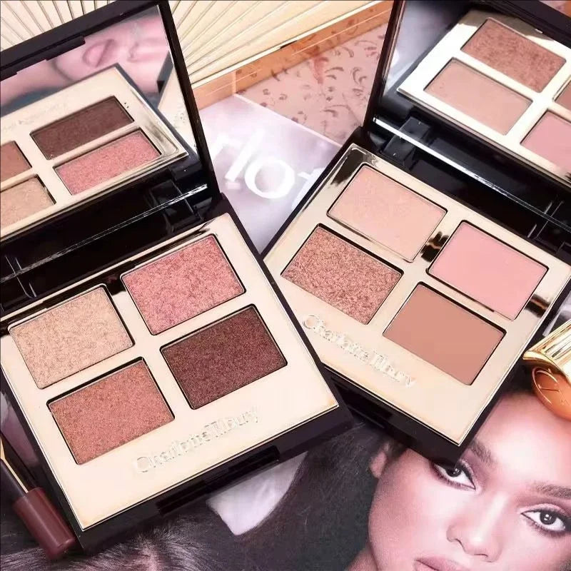 Tidesmit 9 color rose pink eyeshadow palette featuring pearly matte and glitter finishes texture close-up