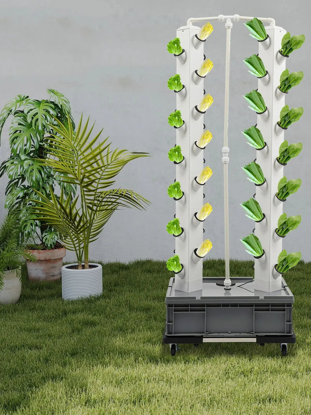 Hydroponic growing tower with green leafy plants in white columns, black base tank on wheels