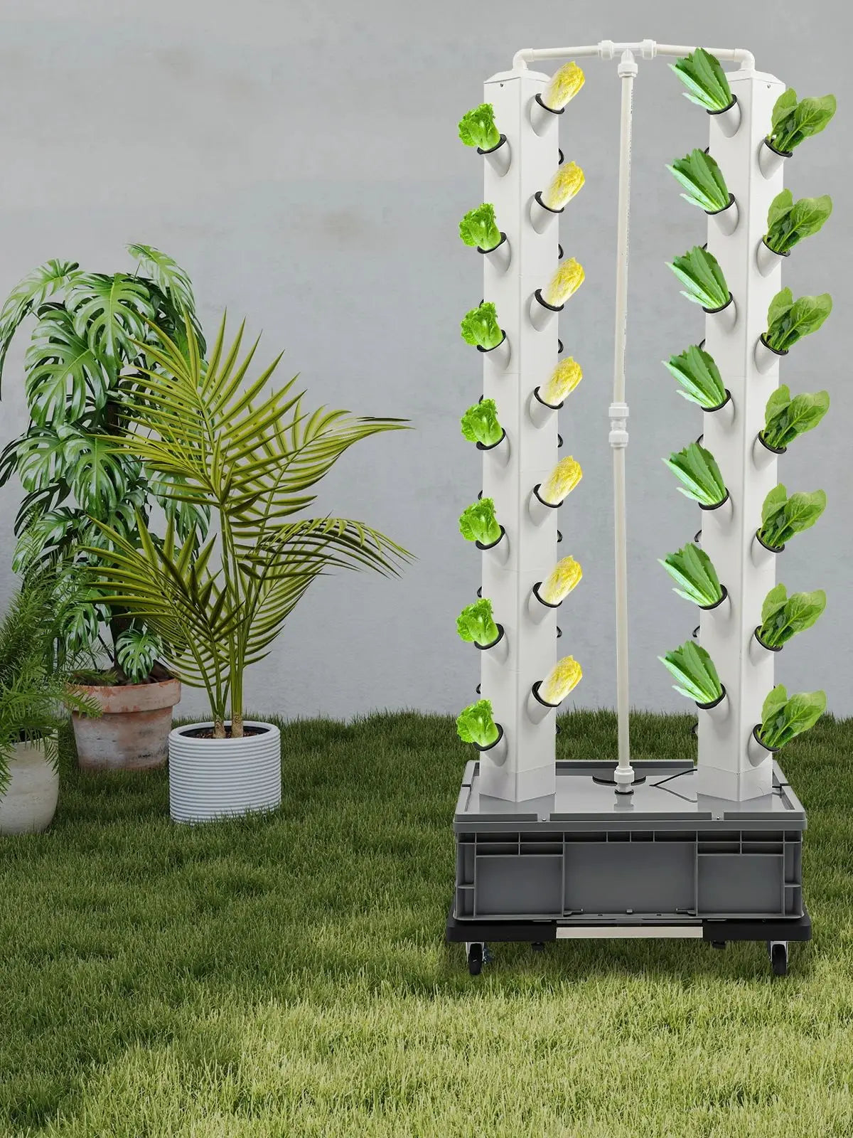 Hydroponic growing tower with green leafy plants in white columns, black base tank on wheels