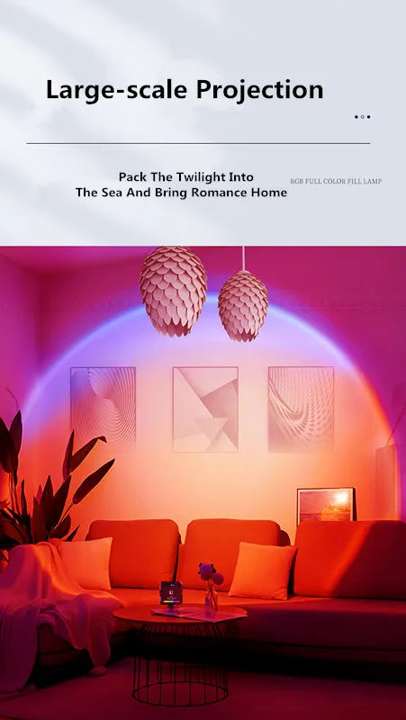 Sunset lamp projecting a large, vibrant pink and orange circular gradient onto a living room wall.