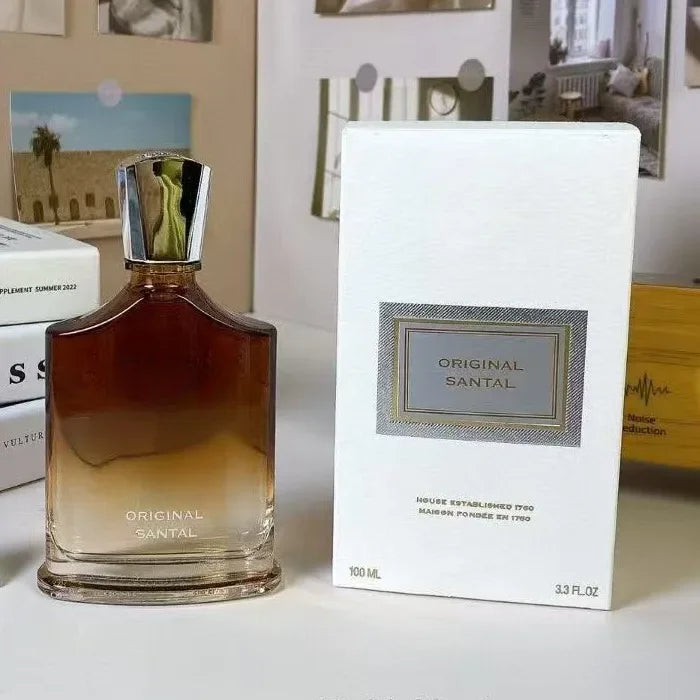 Creed Original Santal 100ml men's cologne in an elegant gradient glass bottle with silver cap and luxury white box.