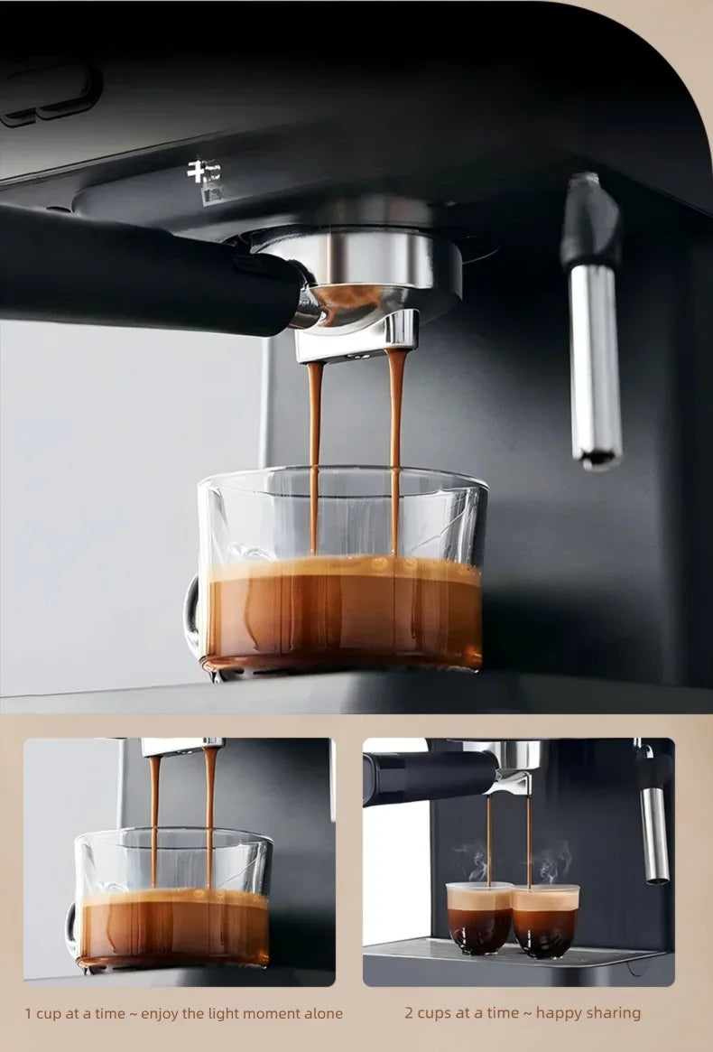 Black espresso machine pouring coffee into glass cups, features double spout for brewing one or two cups at a time.
