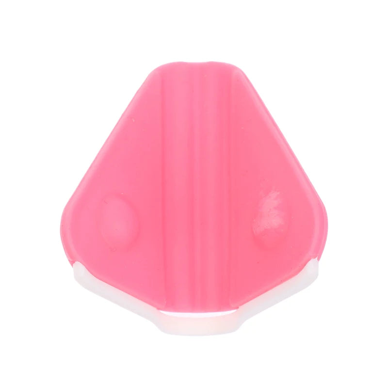 Pink silicone nose shaper clip for bridge lifting and straightening, compact facial beauty tool for home use.