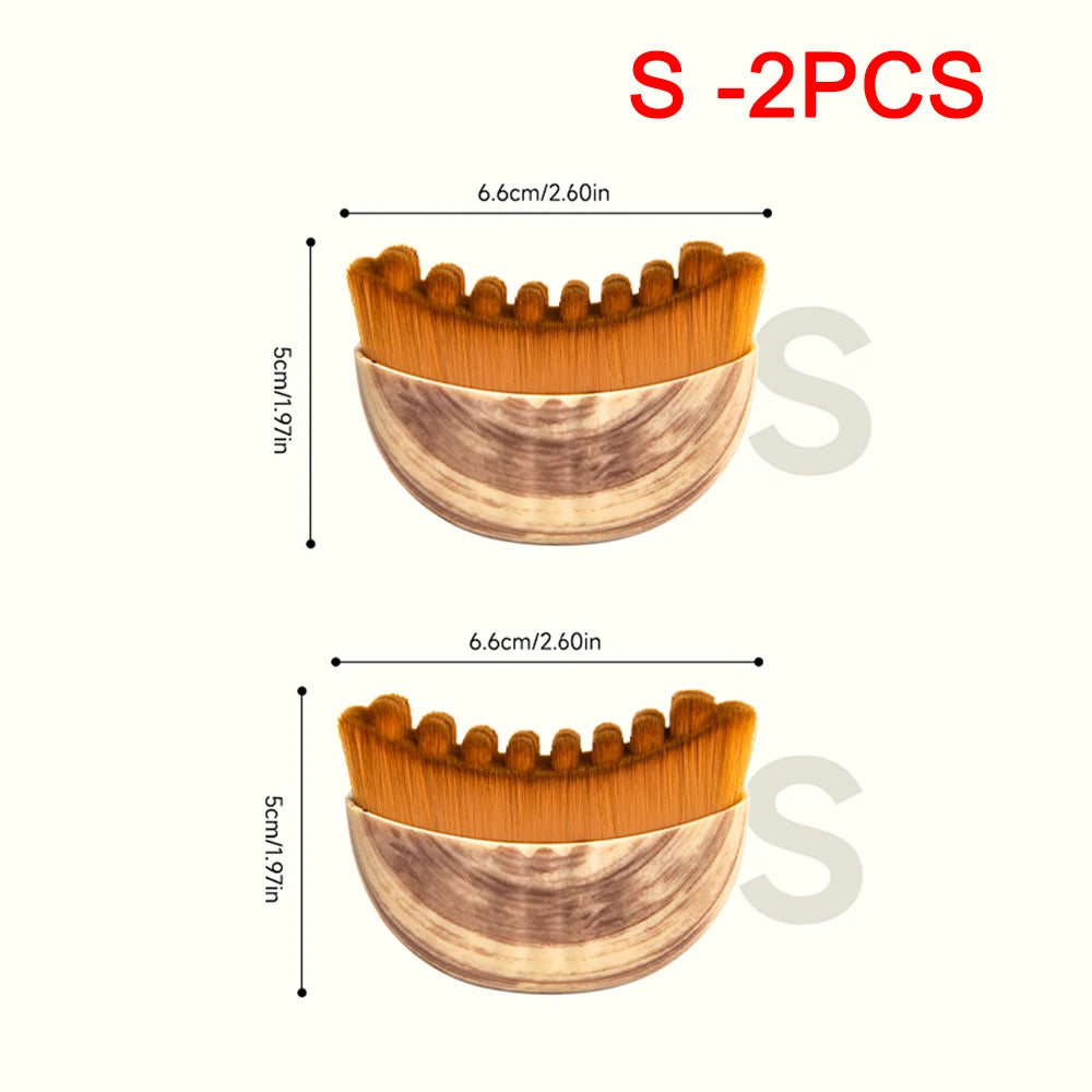 Two small, arched facial massage brushes with brown bristles and a wood-grain handle, labeled with size dimensions.