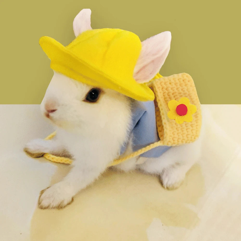 Cute rabbit wearing a blue vest, yellow hat, and floral bag. Perfect comfortable outdoor harness set for small pets.