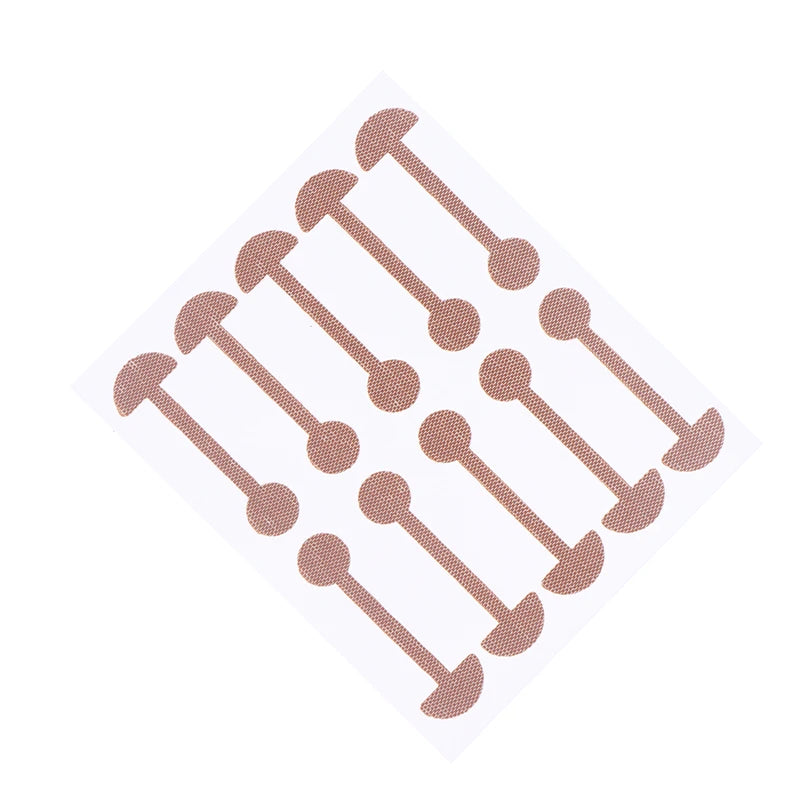 Invisible beige nose wing stickers, narrow nose lifting patches on a sheet, face care tool for reshaping nose wings.