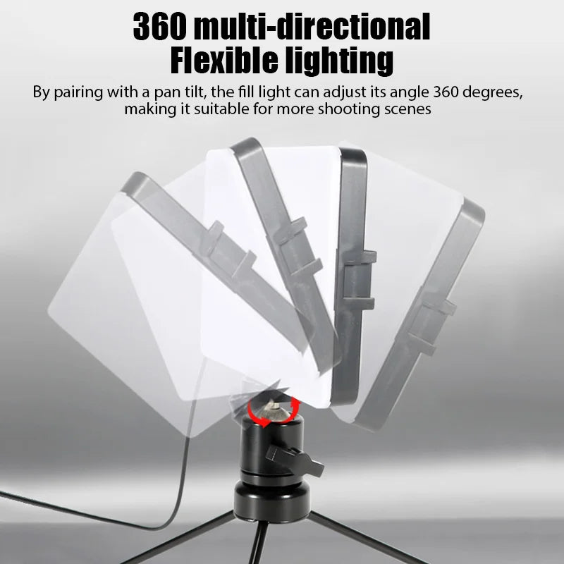Rectangular white LED fill light on a black pan-tilt tripod head, showing 360-degree rotation for photography.