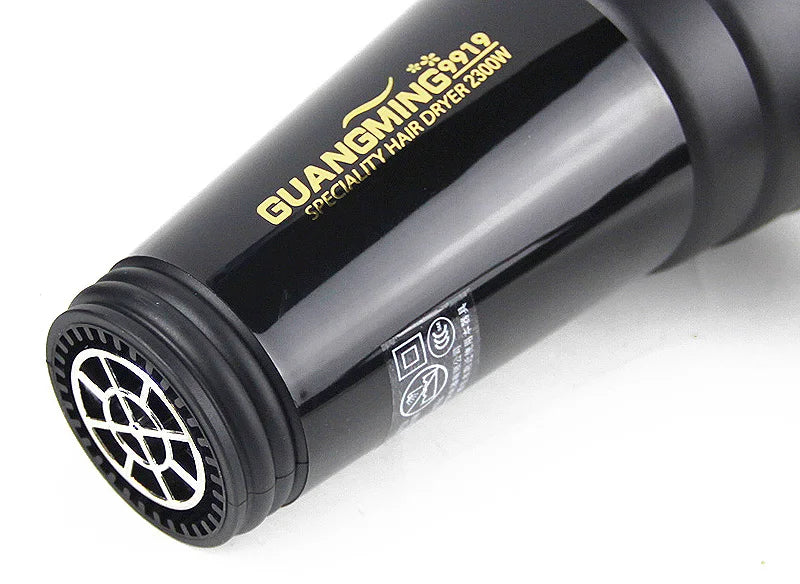 Black 2300W professional salon hair dryer with air nozzle and sleek, durable heat-resistant finish.