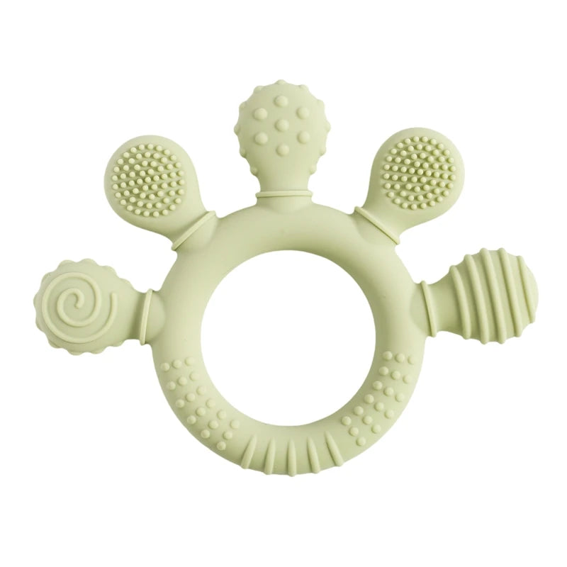 Sage green silicone teething ring toy for baby relief.