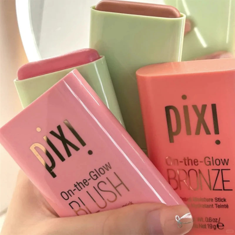 Tidesmit Pixi On-the-Glow cream blush stick in juicy ruby shade showing hydrated buildable makeup texture swatch