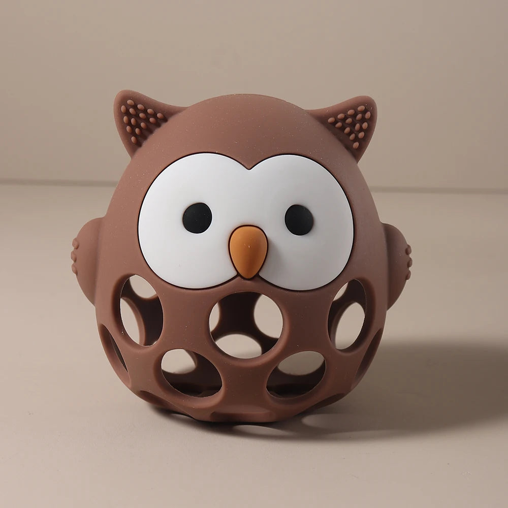 Brown silicone owl baby teething toy for relief.