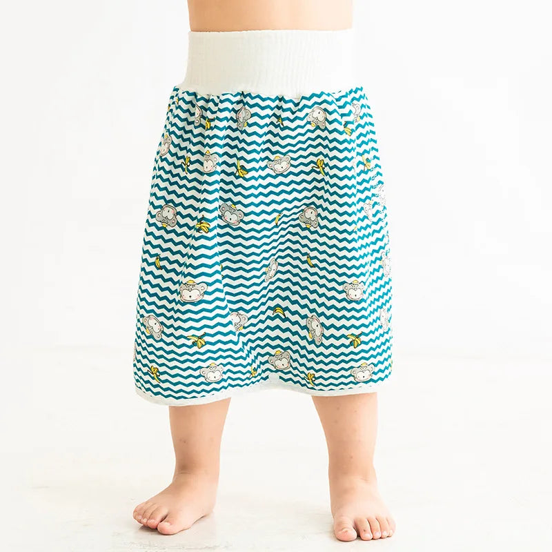 Baby care diaper skirt with monkey and banana print, high-waisted waterproof design for toddlers.