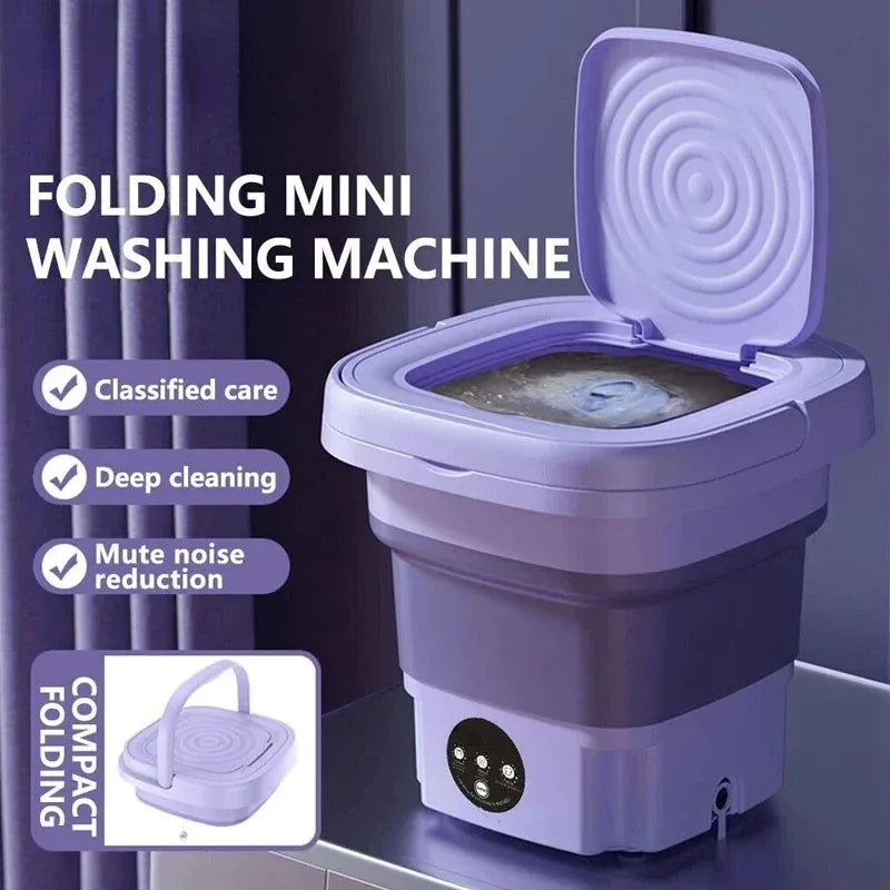 Folding mini washing machine in purple with an open lid, compact portable design for deep cleaning.