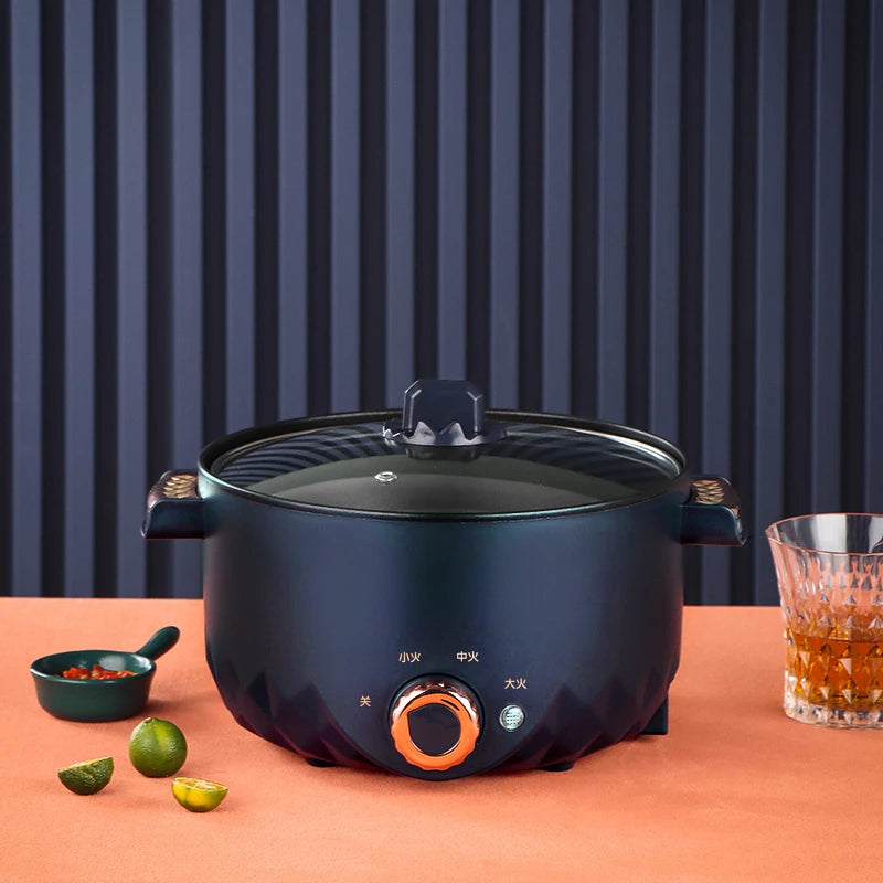 Dark blue electric hot pot multi-cooker with glass lid and orange control knob