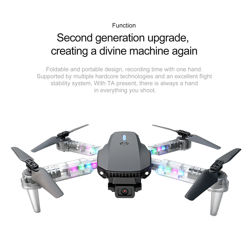 Foldable grey drone with a center camera and translucent, colorful LED-lit arms for aerial photography.