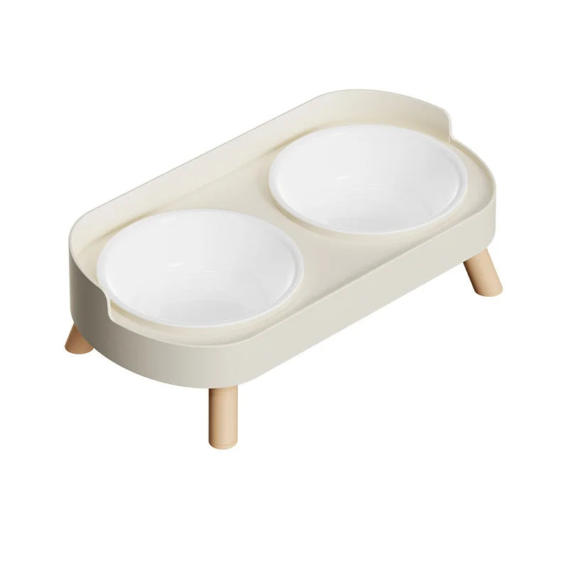 Elevated dual pet feeder with white bowls and cream stand for ergonomic neck protection for cats and dogs.