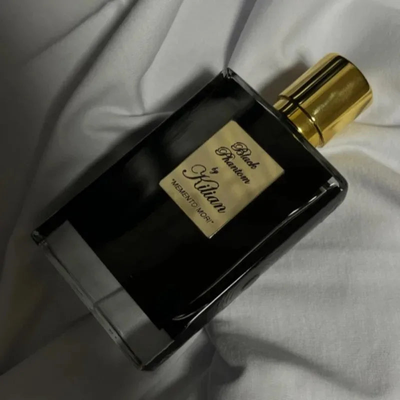 Kilian Black Phantom Unisex EDP, 50ml. Niche woody oriental fragrance in a sleek black rectangular glass bottle.