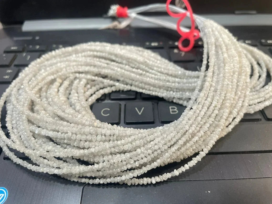 White raw diamond bead strand, 2–3mm small beads gathered into stacked coils