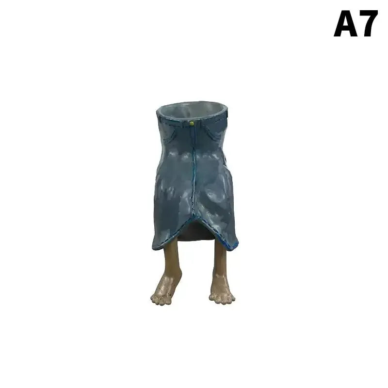 Teal-blue leggy resin planter with draped sides and standing gray legs
