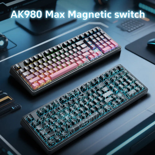 Two AJAZZ AK980 Max magnetic switch keyboards with 98% layouts, one with pink gradient and one with spiderweb keycaps.