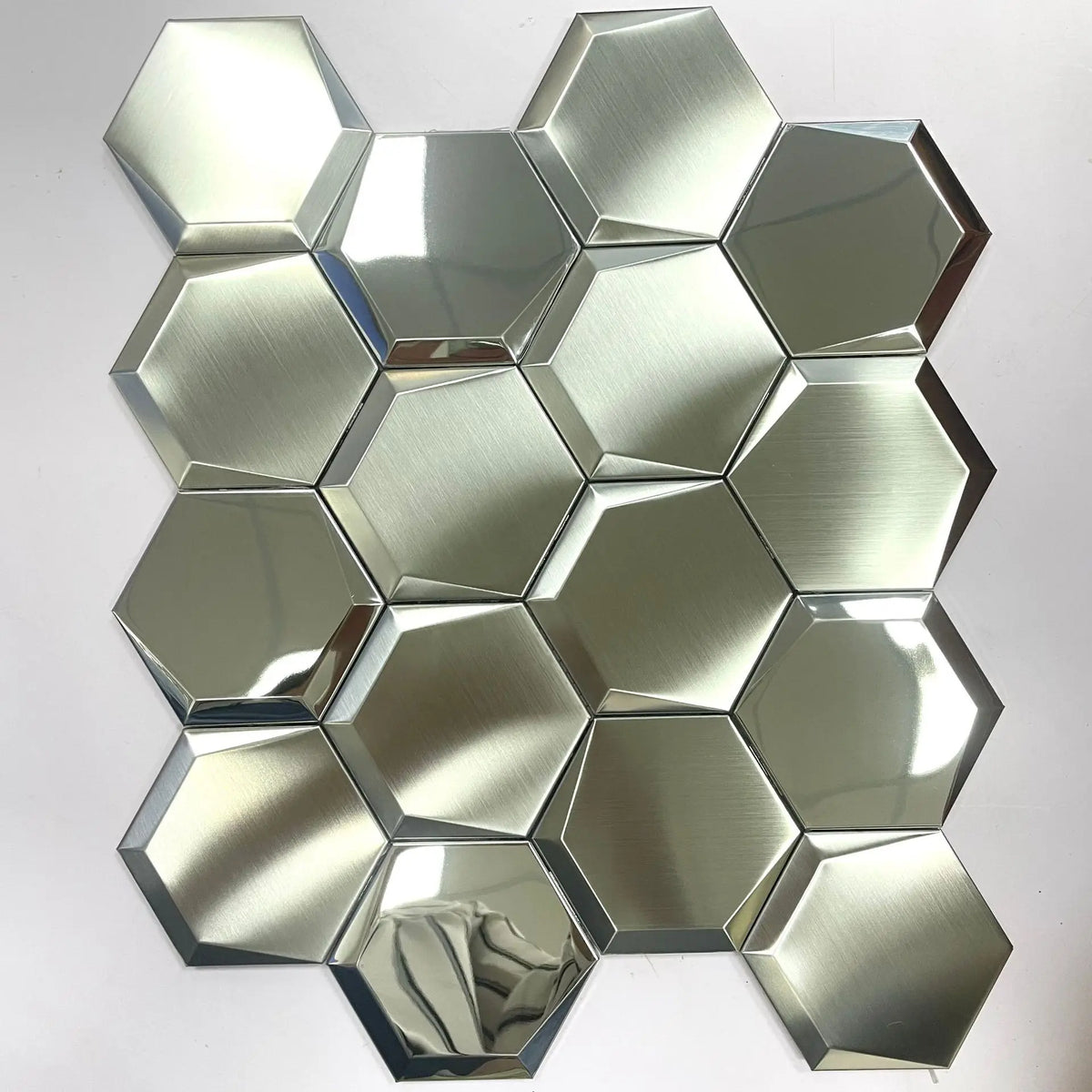 Hexagon self-adhesive metal mosaic tiles panel, light silver reflective hexagon pattern.