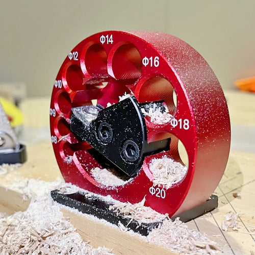 Wood dowel maker jig kit red 8-hole circular guide with black blade assembly on wood
