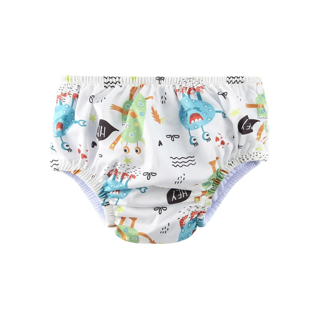 Reusable baby swim diaper with cute colorful monster print for infants and toddlers. Waterproof baby care essential.