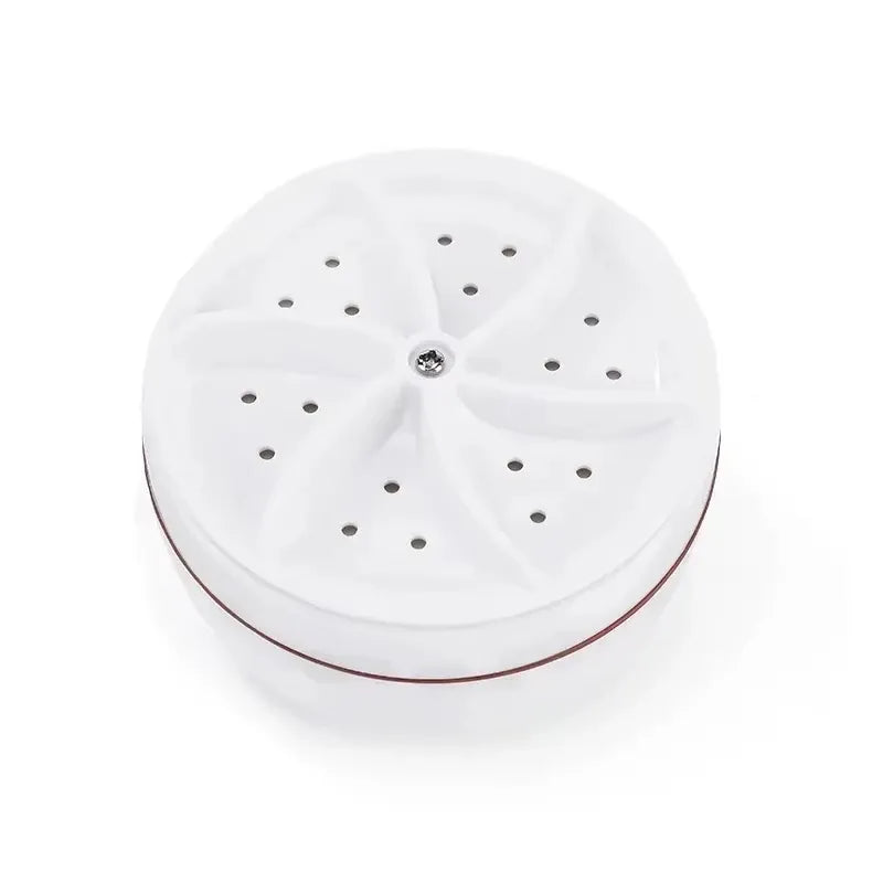 Portable washing machine turbine, round white mini washer with swirling fin pattern for travel laundry.